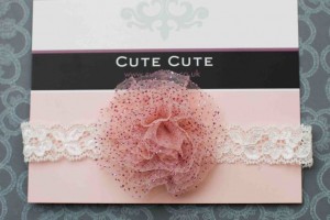 Delicate dusky pink sheer flower on an ivory lace headband