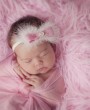 Beautiful marabou feather with pink grosgrain bow finished with pink rhinestone on a soft elastic headband