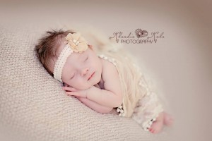 Delicate headband with flower in champagne with pearls and stones