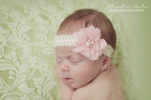 Delicate headband with flower in light pink with pearls and stones