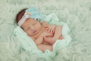 Exclusive turquoise goose feather and Swarovski crystals and pearls on a wide lace headband