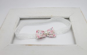 Pink medium size double bow on pink soft elastic