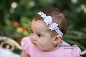 White satin bow with lace and rhinestone