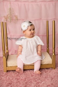 White flower, decorated with rhinestone, feather and net