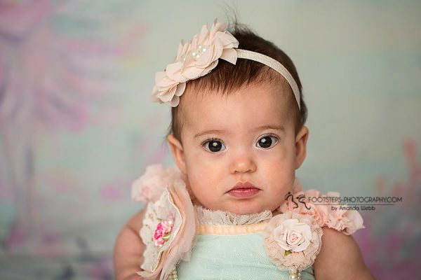 p-8150-11150238_10153330767700676_486330232002480964_n.jpg Light peach chiffon flower with rhinestone on soft elastic band