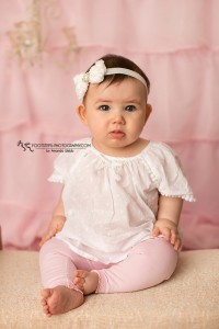 Ivory bow with large rhinestone