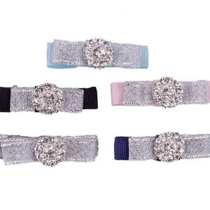 Silver and white clip with rhinestone