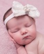 Sequin white bow with rhinestone on soft elastic