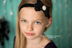 Black rosey bow with large rhinestone