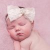 Nude large lace bow with sparkly stone on soft elastic headband