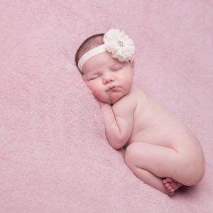 Ivory chiffon flower with sparkly rhinestone on soft elastic lace