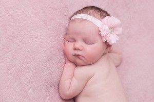 Pink chiffon flower with sparkly rhinestone on soft elastic lace