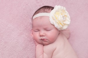 Ivory rose with rhinestone on a soft elastic headband