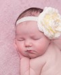 Ivory rose with rhinestone on a soft elastic headband