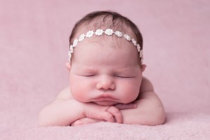 Delicate ivory satin flowers individually decorated with pearls