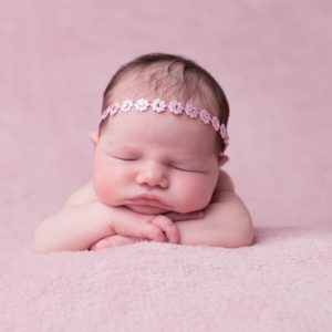 Delicate pink satin flowers individually decorated with diamante