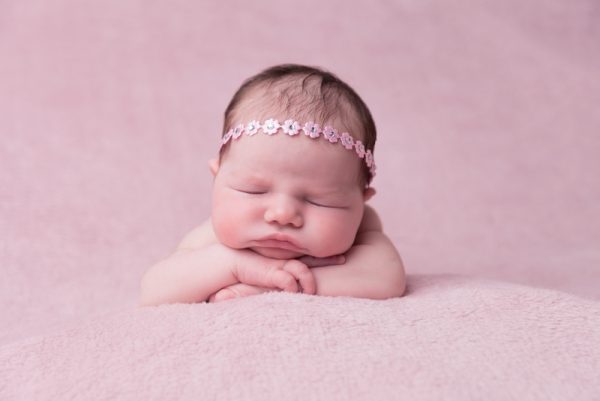 Delicate pink satin flowers individually decorated with diamante