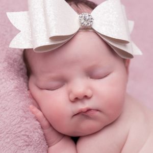 White oversized glitter bow with rhinestone headband