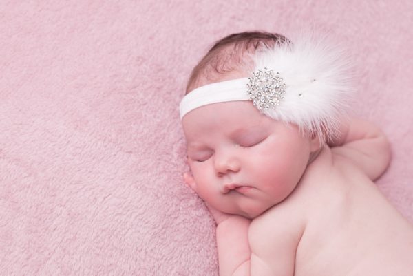 p-9810-Cute-Cute-31.jpg White feather headband with large rhinestone and Swarovski diamante