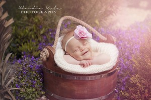 Pink two toned flower with rhinestone and feather