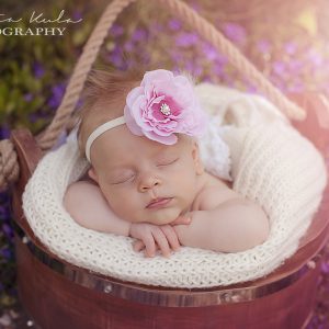 Pink two toned flower with rhinestone and feather