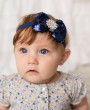 Blue sequin bow decorated with rhinestone on a soft blue elastic headband