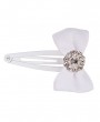 Grosgrain bow in white decorated with rhinestone on a white snap clip