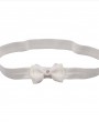 Small ivory single bow with pearl heart and diamante on a soft headband