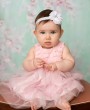 Delicate white chiffon ruffled flower decorated with rhinestone on a soft headband