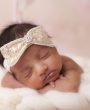 Gold sequin bow with rhinestone on soft elastic headband
