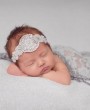 Exclusive crystal and pearl design on a silver elastic headband