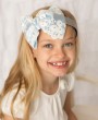 Oversized baby blue lace bow on a silver alice band