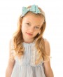 Frozen blue glitter bow decorated with rhinestone on a satin alice band