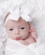 White double frilly bow with rhinestone on soft headband