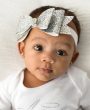 Silver oversized glitter bow with rhinestone on elastic headband