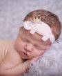 Cute pink elephant with glitter gold crown on soft headband