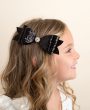 Black glitter large bow with rhinestone on a clip