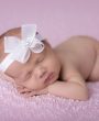 Delicate dotty bow with rhinestone on soft elastic headband