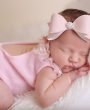 Soft shimmery pink large bow with rhinestone on soft headband