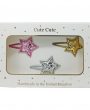 Set of three glitter stars on snap clips in a gold gift box