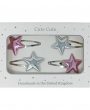Silver and pink metallic star set of snap clips in a silver gift box