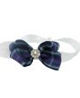 Checked purple and white gingham medium bow with rhinestone button on a soft headband
