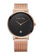 Rose gold watch with a black face and stainless steel mesh bracelet
