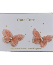 Set of two peach butterflies with gold cased rhinestones on alligator clips